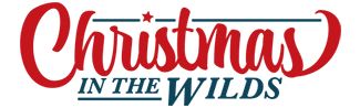 Logo for Christmas in the Wilds. The word 'Christmas' is written in large red cursive with a swooping tail extending from the 's.' Below, 'In the Wilds' is written in smaller, dark blue capital letters.